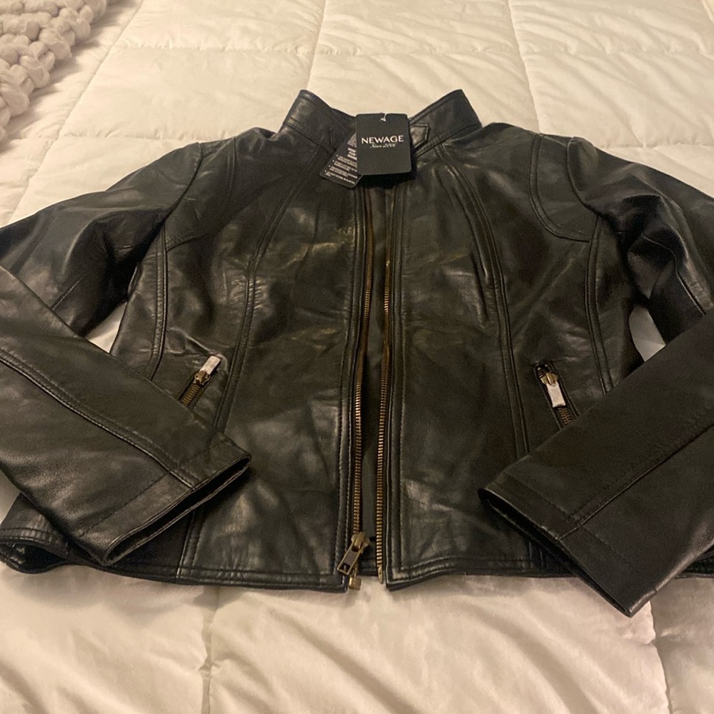 NEWAGE SINCE 2006 Leather Jacket size men’s large. Tags are included.